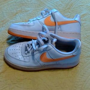 White women's Nike 10